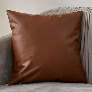 Two faux leather pillow covers